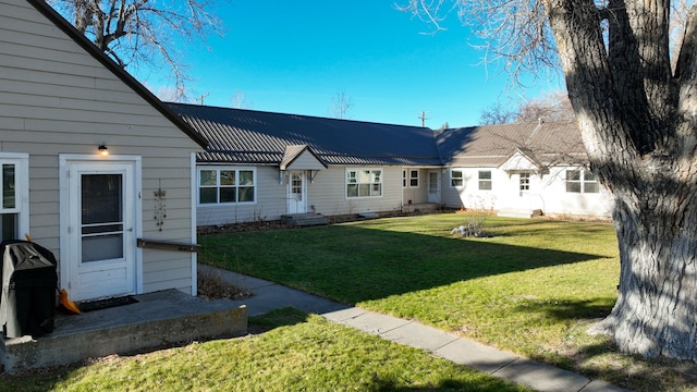 exterior space featuring a yard