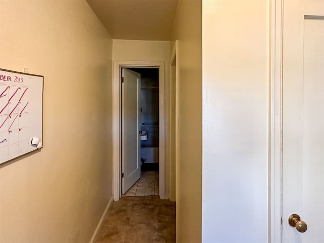 corridor featuring tile flooring