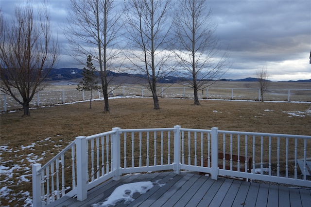 wooden terrace with a mountain view