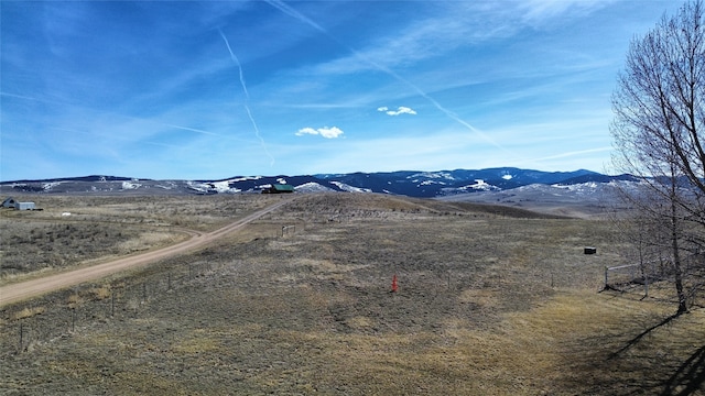 property view of mountains with a rural view