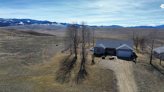 birds eye view of property featuring a rural view and a mountain view