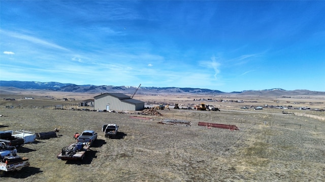 view of mountain feature featuring a rural view