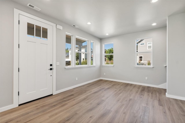 entrance foyer with light wood-type flooring