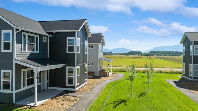 view of side of property featuring a mountain view