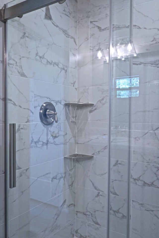 bathroom featuring a stall shower