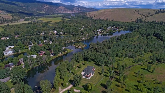 aerial view with a water and mountain view