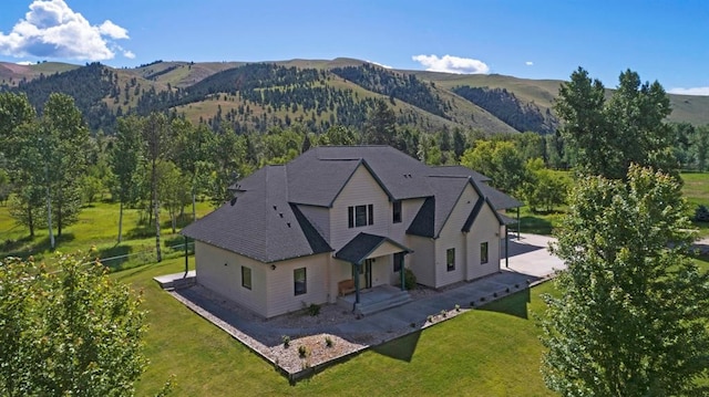 aerial view featuring a mountain view