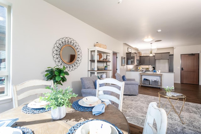 dining space with light hardwood / wood-style flooring