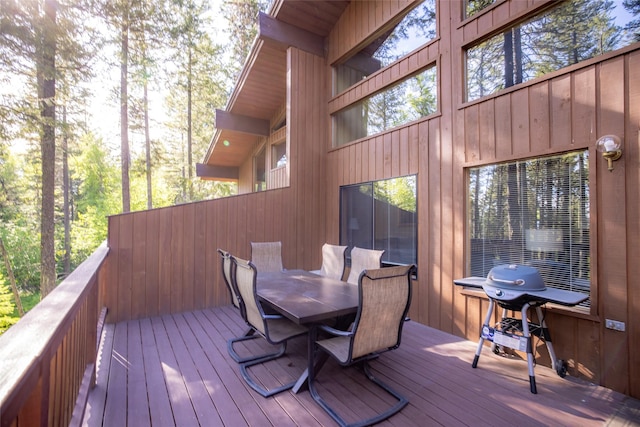 wooden terrace featuring area for grilling