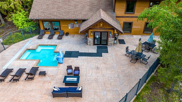 105 Cedar Way Unit 105, Whitefish, MT 59937 - view of pool featuring french doors, a fenced backyard, and a patio area