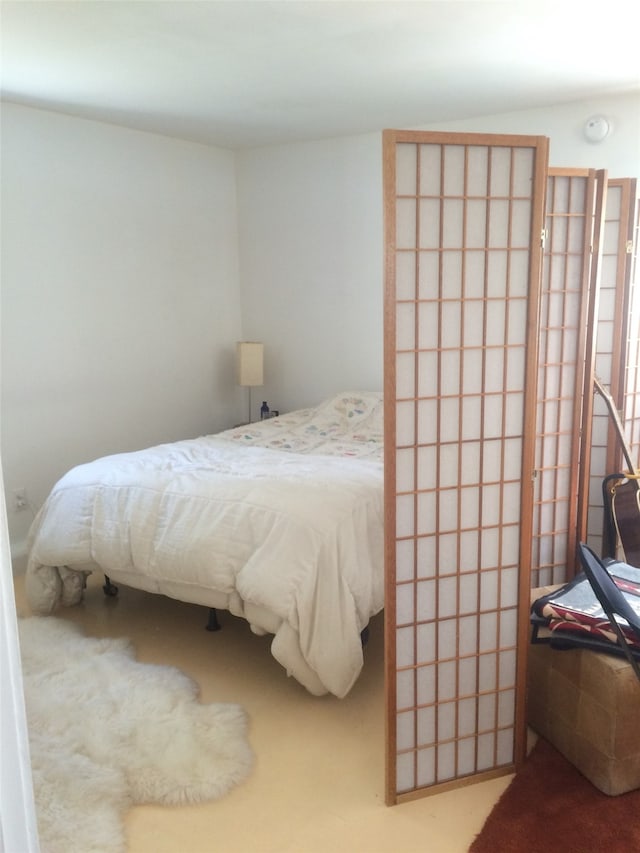 bedroom featuring carpet