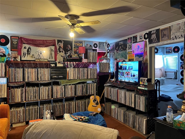 interior space featuring ceiling fan