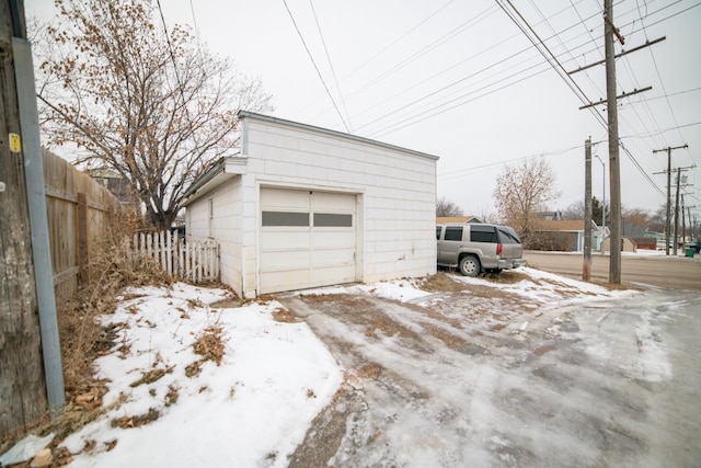 view of snow covered garage