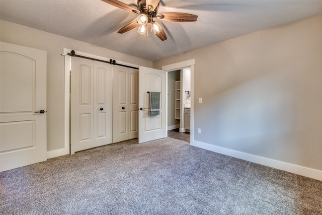 unfurnished bedroom featuring carpet flooring, a closet, and ceiling fan