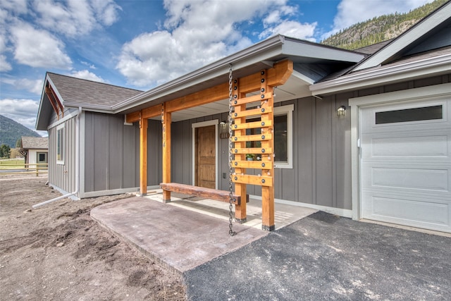 property entrance with a garage