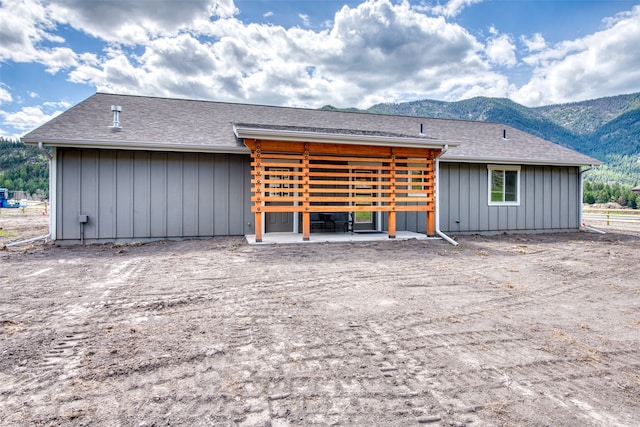 exterior space featuring a patio area and a mountain view