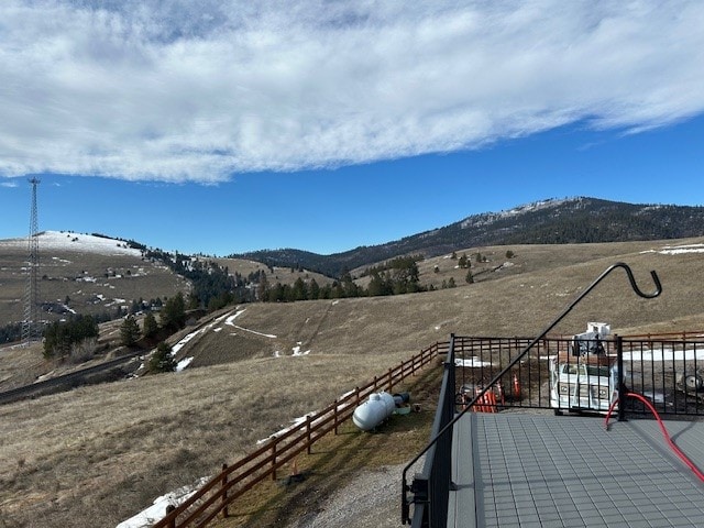 property view of mountains featuring a rural view