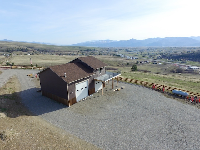 drone / aerial view with a rural view and a mountain view