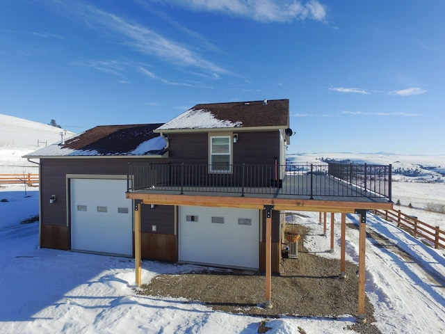 front facade with a garage