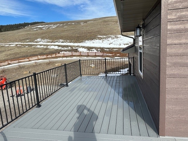 view of snow covered deck