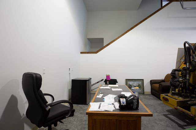 office space featuring concrete flooring