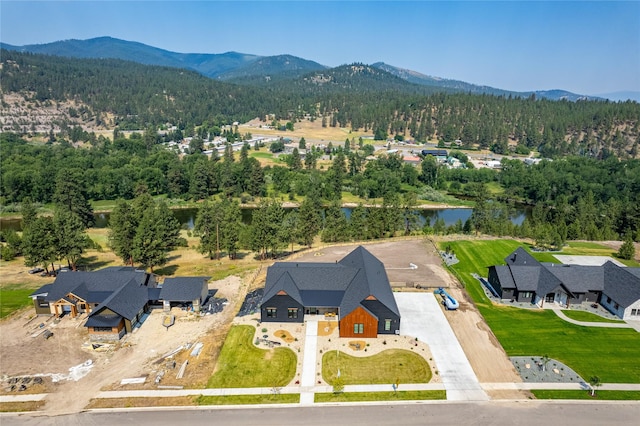 aerial view with a water and mountain view