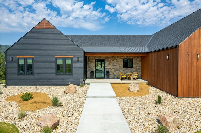 view of front facade with a patio area