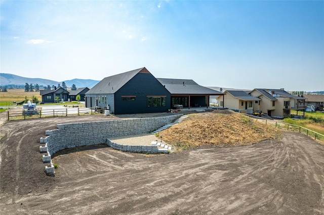 view of front of house with a mountain view