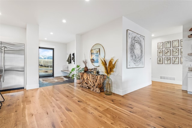 entrance foyer with light wood-type flooring