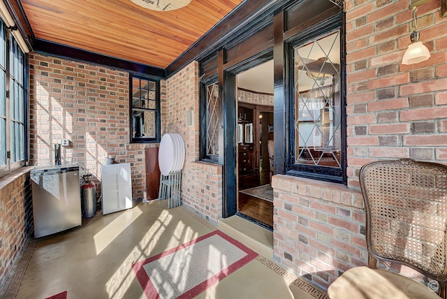 sunroom with wood ceiling