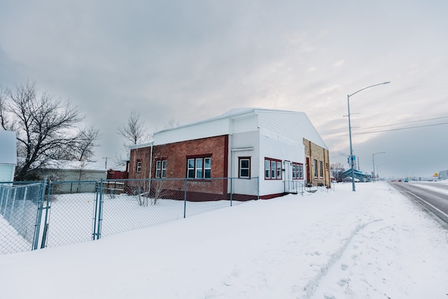 view of snow covered property