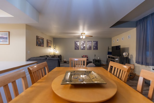 dining space with ceiling fan