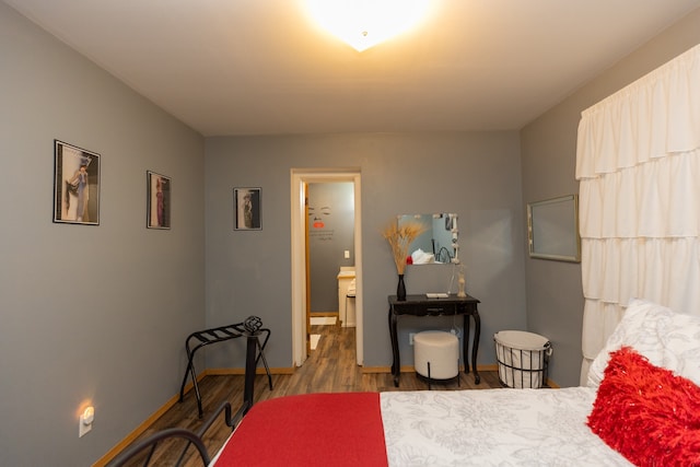 bedroom featuring wood-type flooring