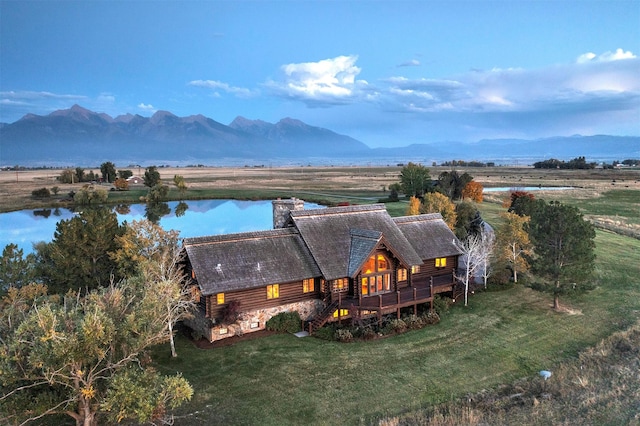 55263 Logan Rd, Charlo, MT 59824 - aerial view of property and surrounding area featuring a water and mountain view