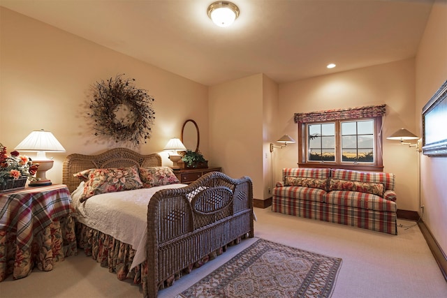 bedroom with light carpet