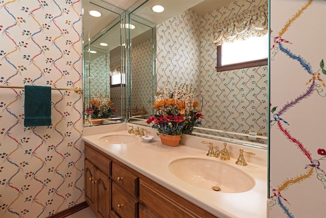 55263 Logan Rd, Charlo, MT 59824 - full bath featuring double vanity, recessed lighting, and wallpapered walls