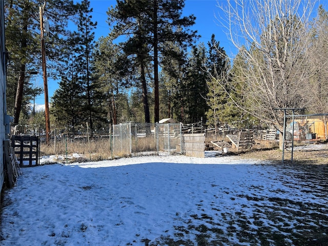 view of yard covered in snow