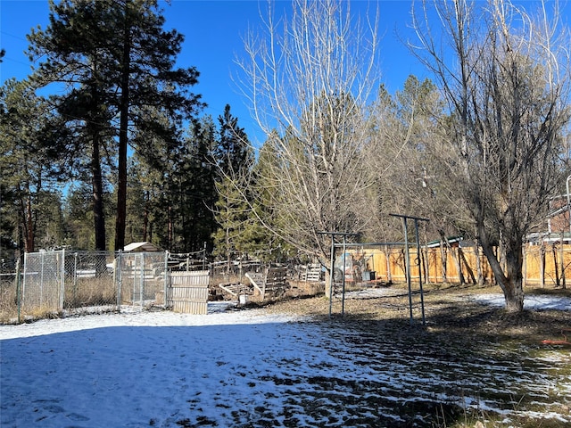 view of yard covered in snow