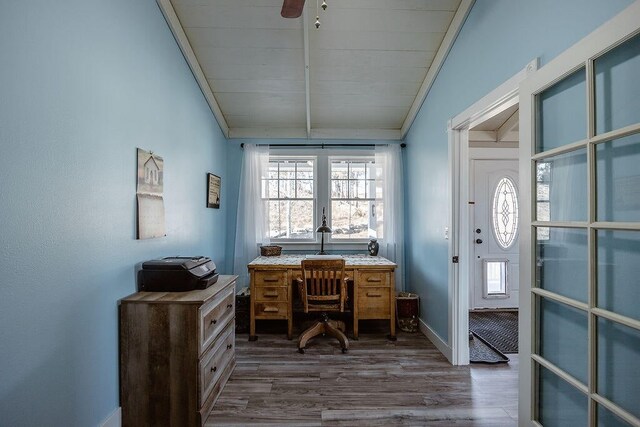 home office with ornamental molding, ceiling fan, and hardwood / wood-style floors