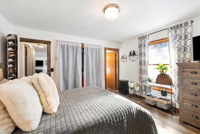 bedroom featuring dark hardwood / wood-style floors