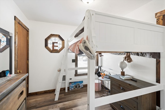 interior space featuring dark hardwood / wood-style flooring and plenty of natural light