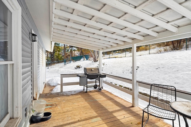 view of snow covered deck