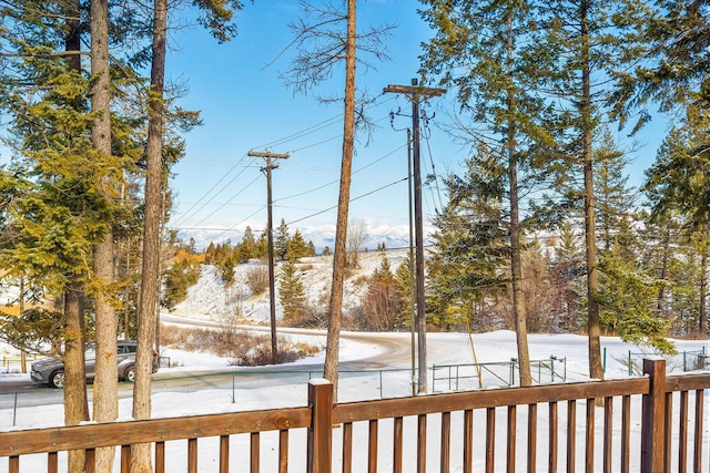 view of snow covered deck