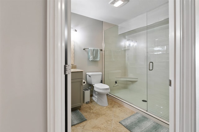 bathroom with walk in shower, toilet, vanity, and tile flooring