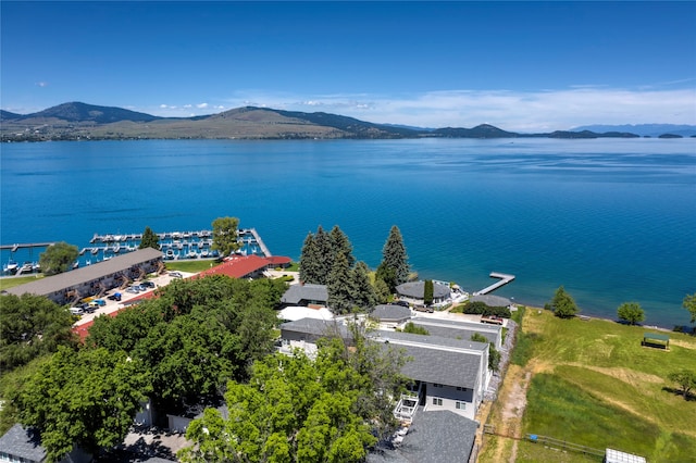 bird's eye view with a water and mountain view