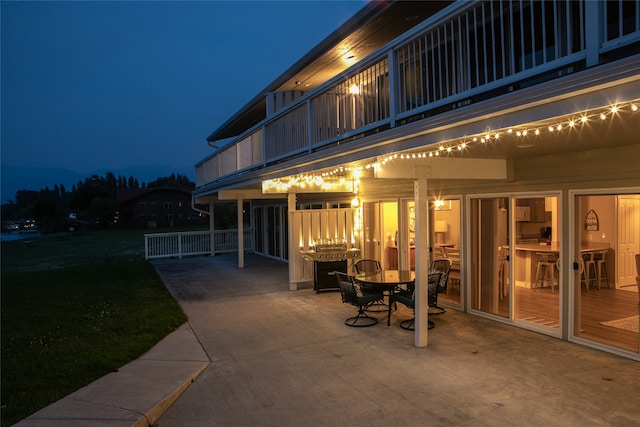 patio terrace at night with a balcony