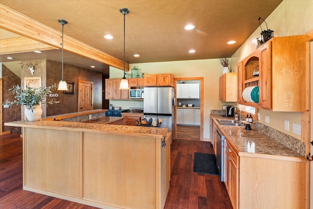 kitchen with dark hardwood / wood-style flooring, stainless steel appliances, sink, beam ceiling, and decorative light fixtures