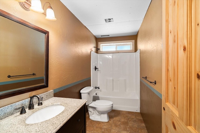 full bathroom featuring shower / tub combination, vanity, and toilet