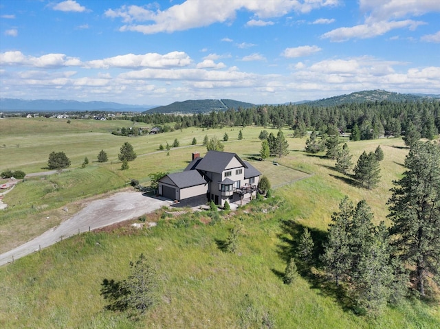 aerial view featuring a mountain view and a rural view