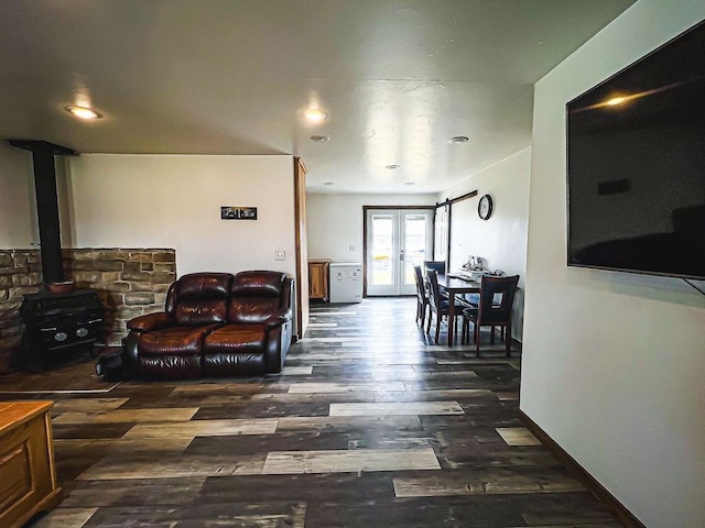 405 S Cherry St, Townsend, MT 59644 - living room with wood finished floors, a wood stove, french doors, and recessed lighting